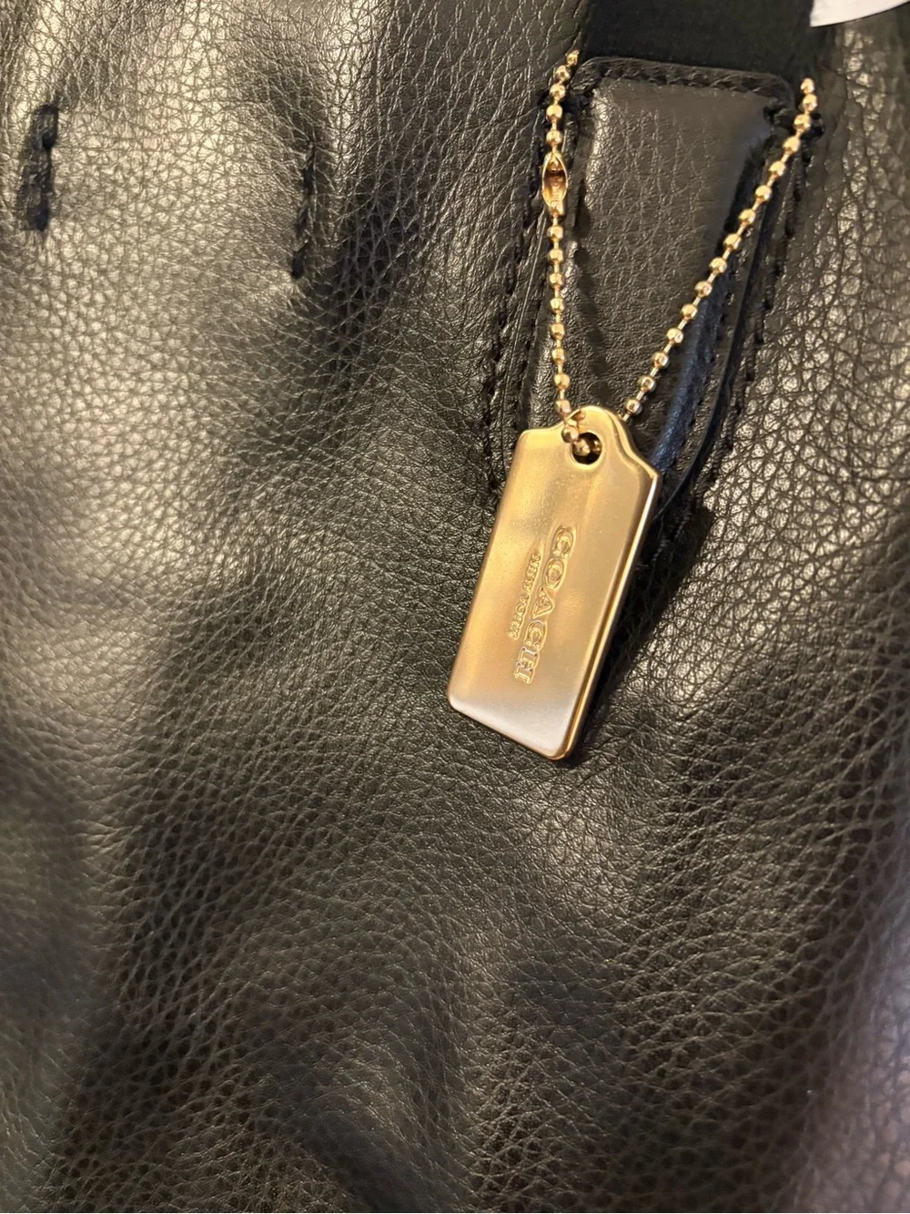 Coach Black Leather Tote with Gold Tag Accent